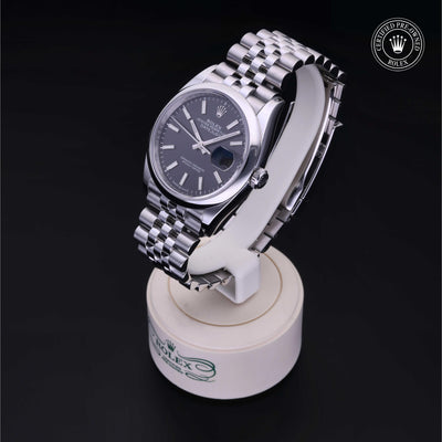 Rolex Certified Pre-owned Datejust M126200-0003 front on black background