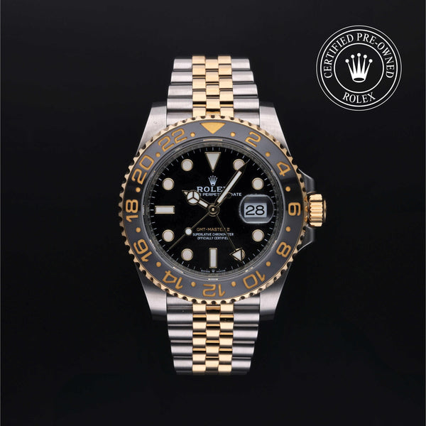 Rolex Certified Pre-owned GMT II M126713GRNR-0001 front on black background