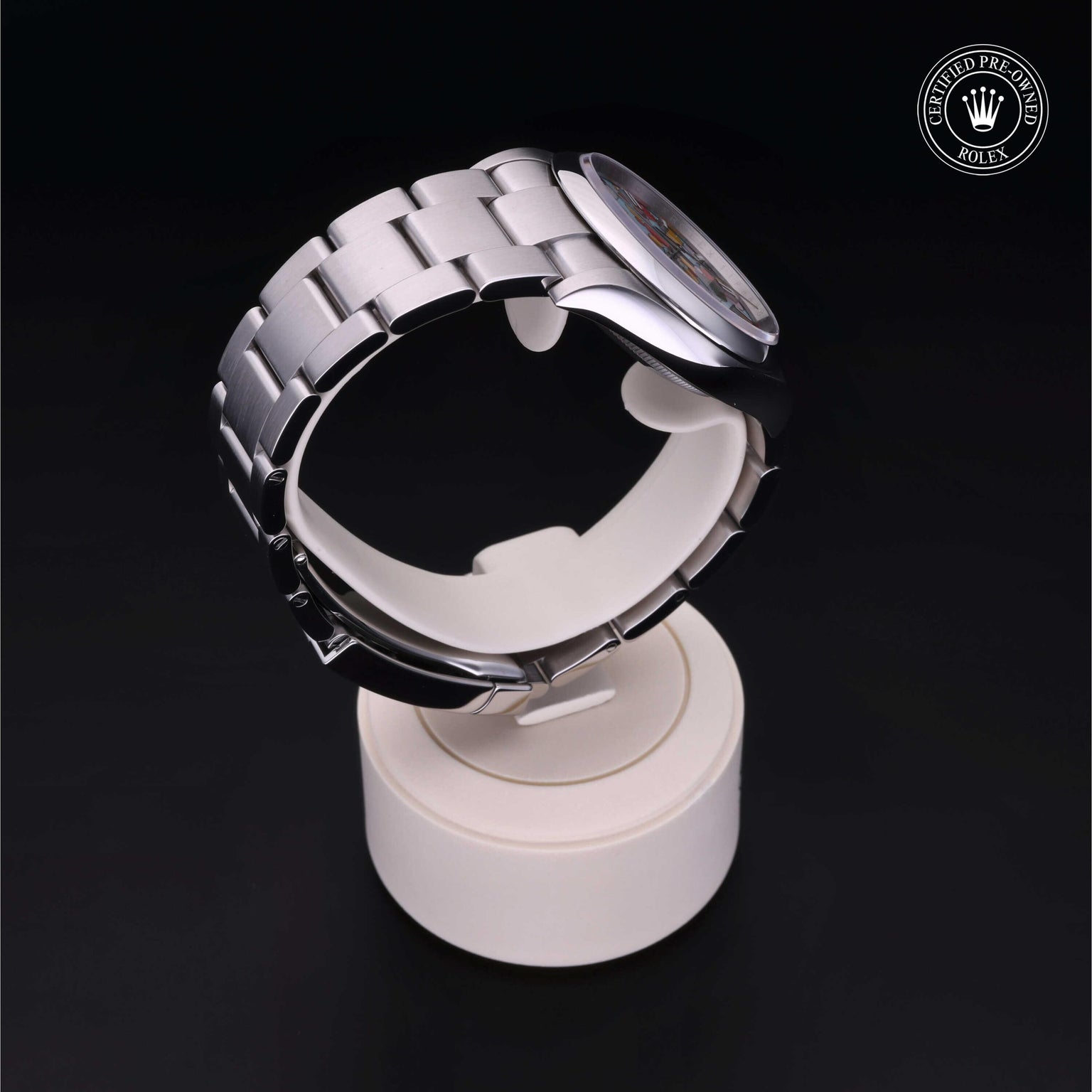 Rolex Certified Pre-owned Oyster Perpetual M126000-0009 front on black background