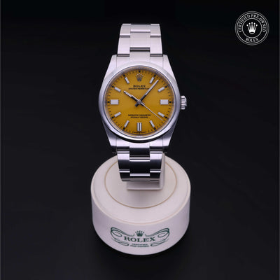 Rolex CPO Oyster Perpetual M126000 front on white background
