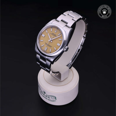 Rolex CPO Oyster Perpetual M126000 front on white background