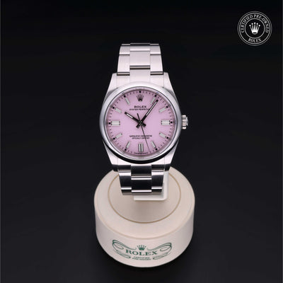 Rolex Certified Pre-owned Oyster Perpetual M126000-0008 front on black background
