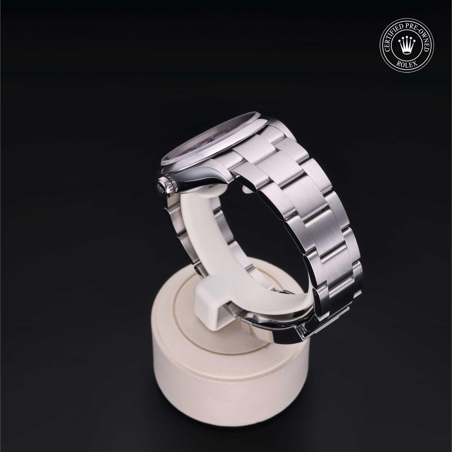 Rolex Certified Pre-owned Oyster Perpetual M126000-0008 front on black background