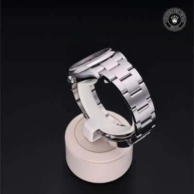 Rolex Certified Pre-owned Oyster Perpetual M126000-0008 front on black background