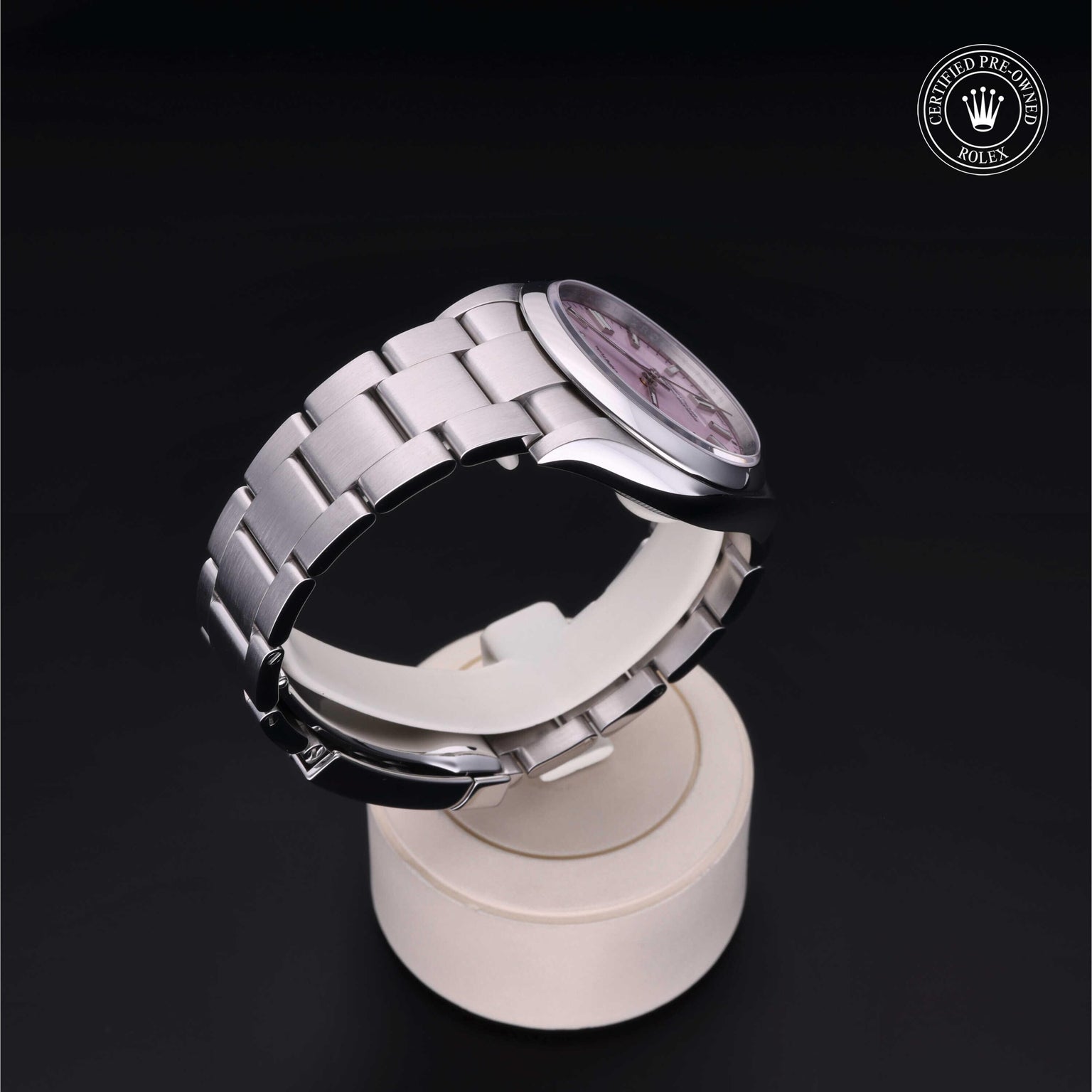 Rolex Certified Pre-owned Oyster Perpetual M126000-0008 front on black background