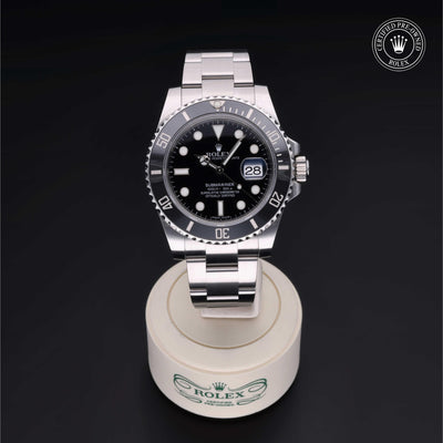Rolex Certified Pre-owned Submariner M116610LN-0001 front on black background