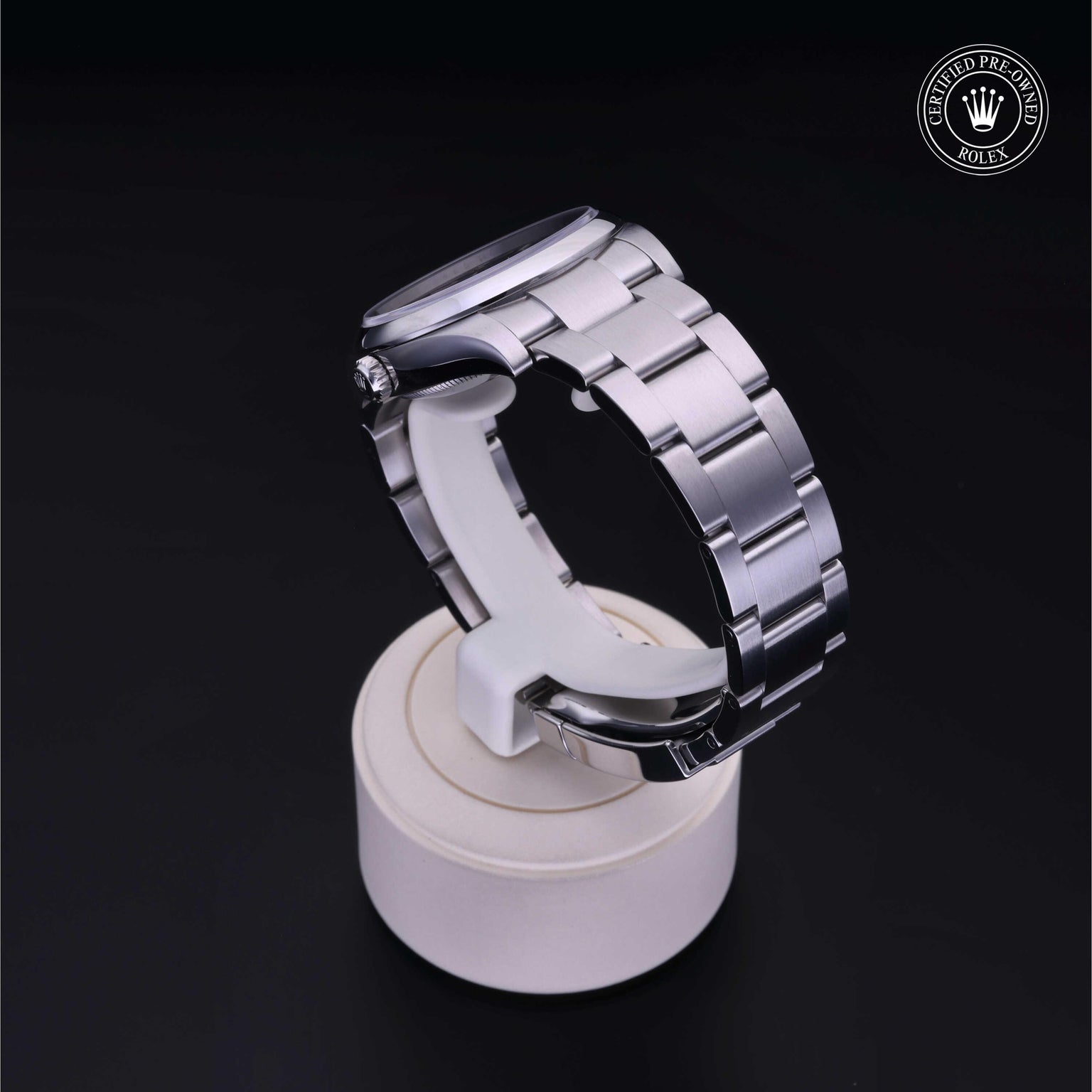 Rolex Certified Pre-owned Oyster Perpetual M114200-0014 front on black background