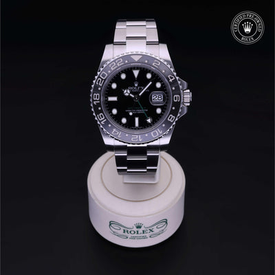 Rolex Certified Pre-owned GMT M116710LN-0001 front on black background