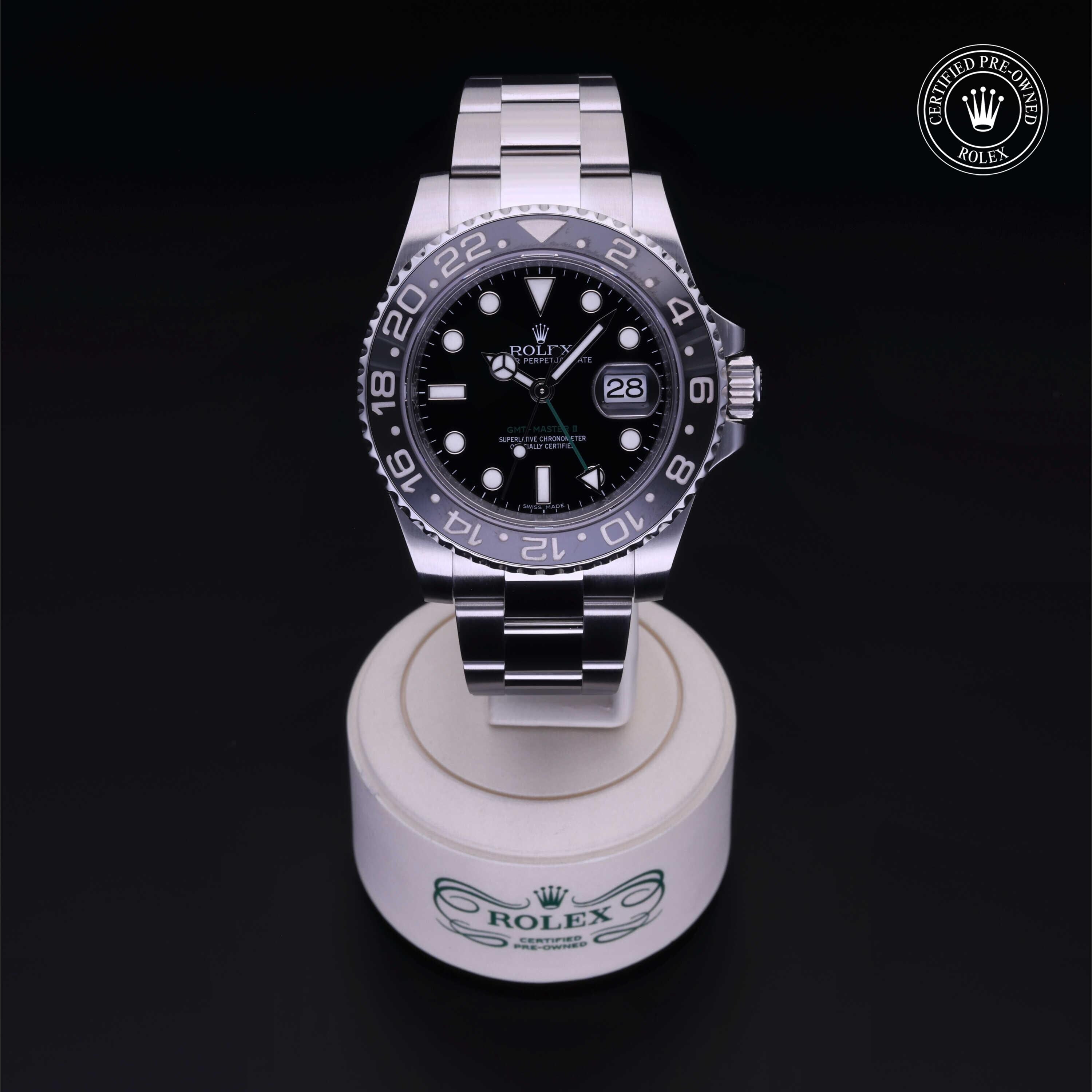 Rolex Certified Pre-owned GMT M116710LN-0001 front on black background