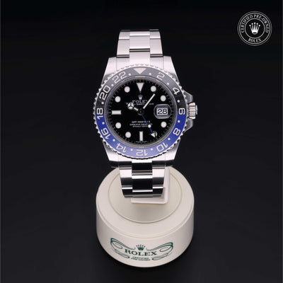 Rolex Certified Pre-owned GMT M116710BLNR-0002 front on black background