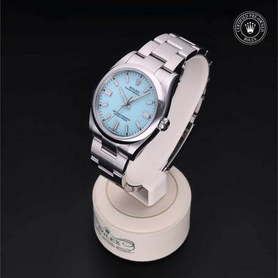 Rolex Certified Pre-owned Oyster Perpetual M126000-0006 front on black background