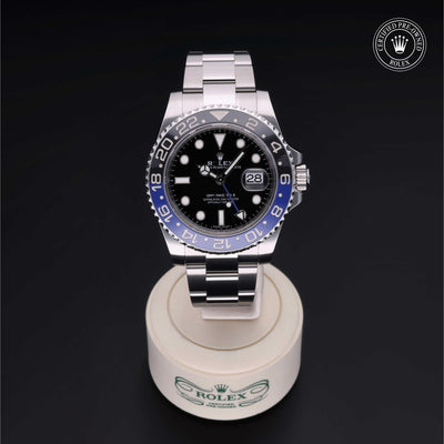 Rolex Certified Pre-owned GMT M116710BLNR-0002 front on black background