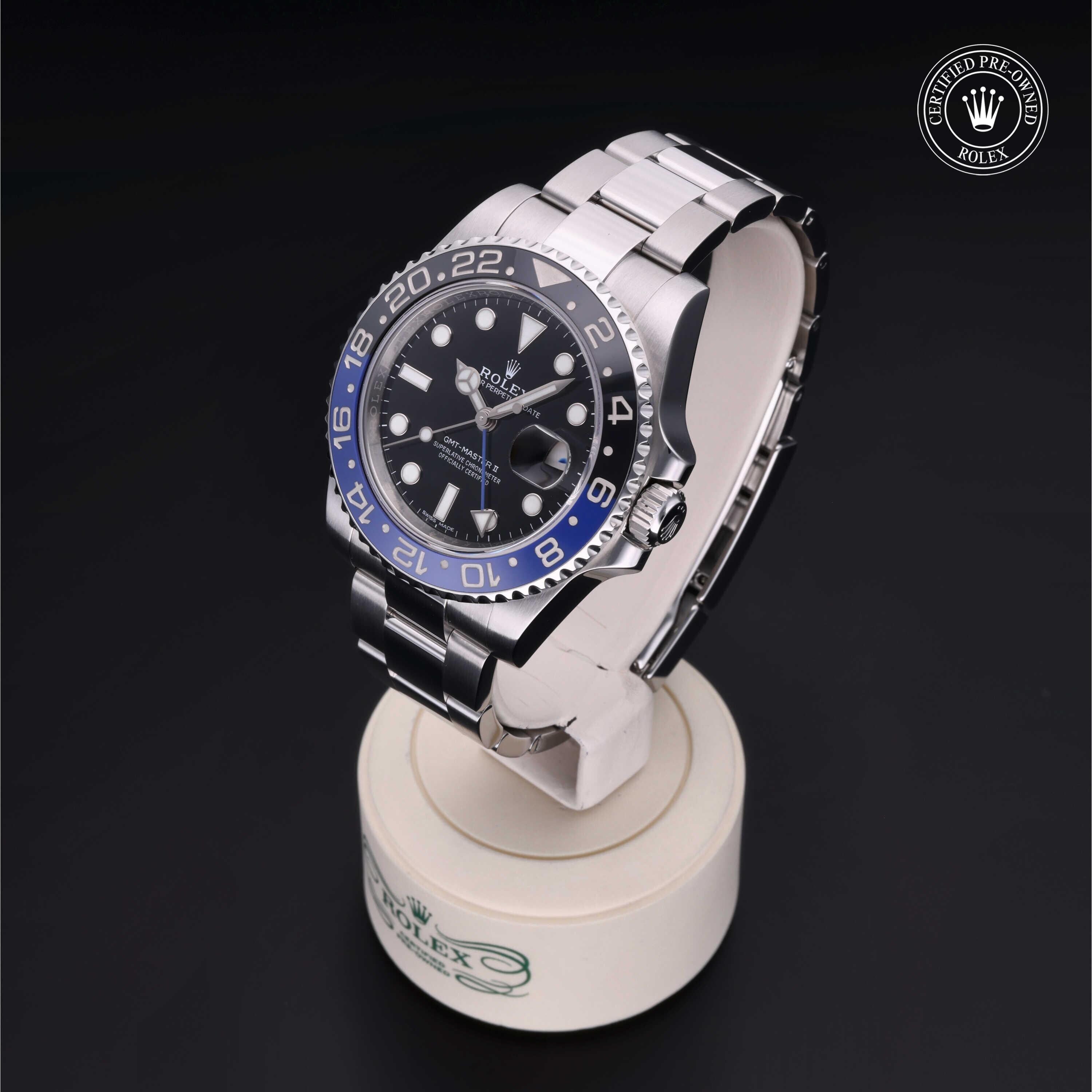 Rolex Certified Pre-owned GMT M116710BLNR-0002 front on black background