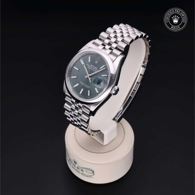 Rolex Certified Pre-owned Datejust M126200-0023 front on black background