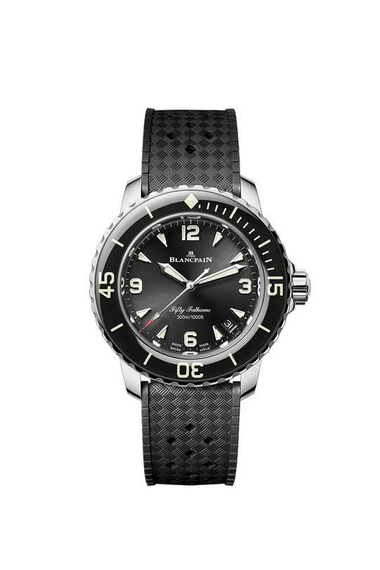Blancpain Fifty Fathoms watch with stainless steel case, black sunburst dial, luminous hands, black rubber strap, and rotatin
