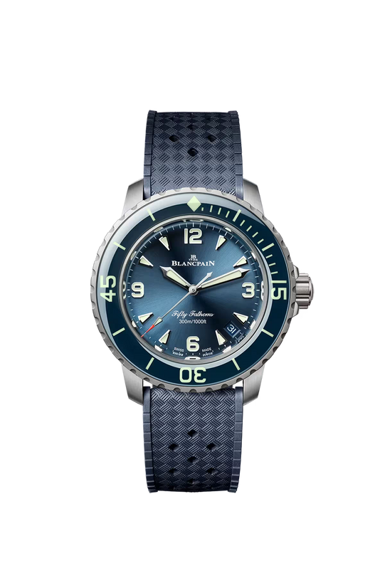Blancpain Fifty Fathoms watch with sunburst blue dial, steel case, dark blue bezel, and textured rubber strap.