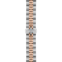 Two-tone watch strap with Tissot logo on a white background