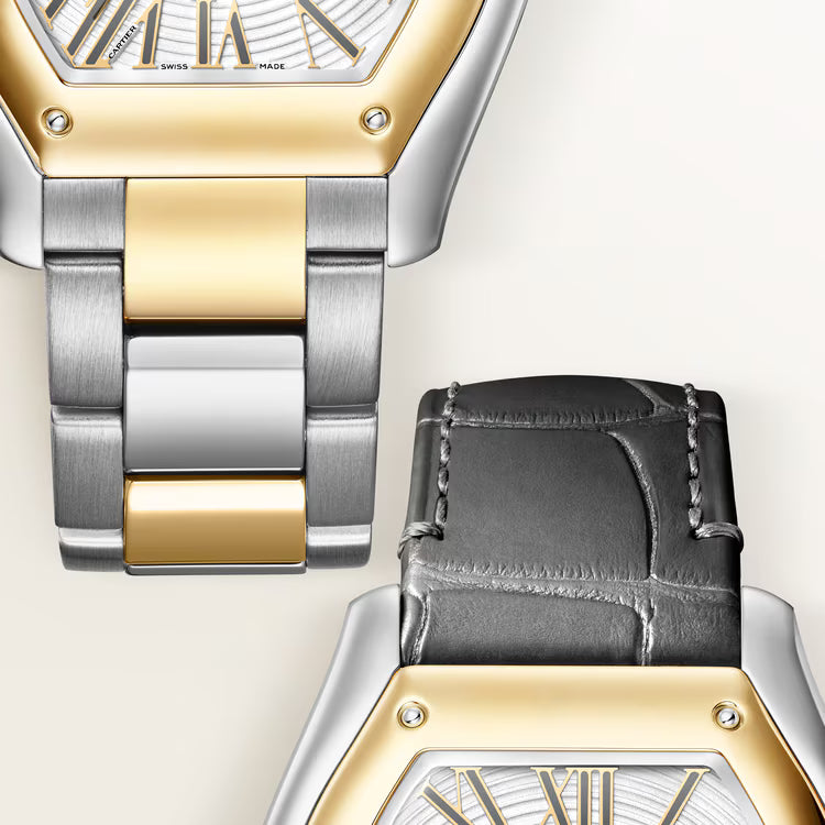 Two-tone watch with gold and silver metal bracelet and black leather strap, hexagonal dial with Roman numerals marked "Swiss 