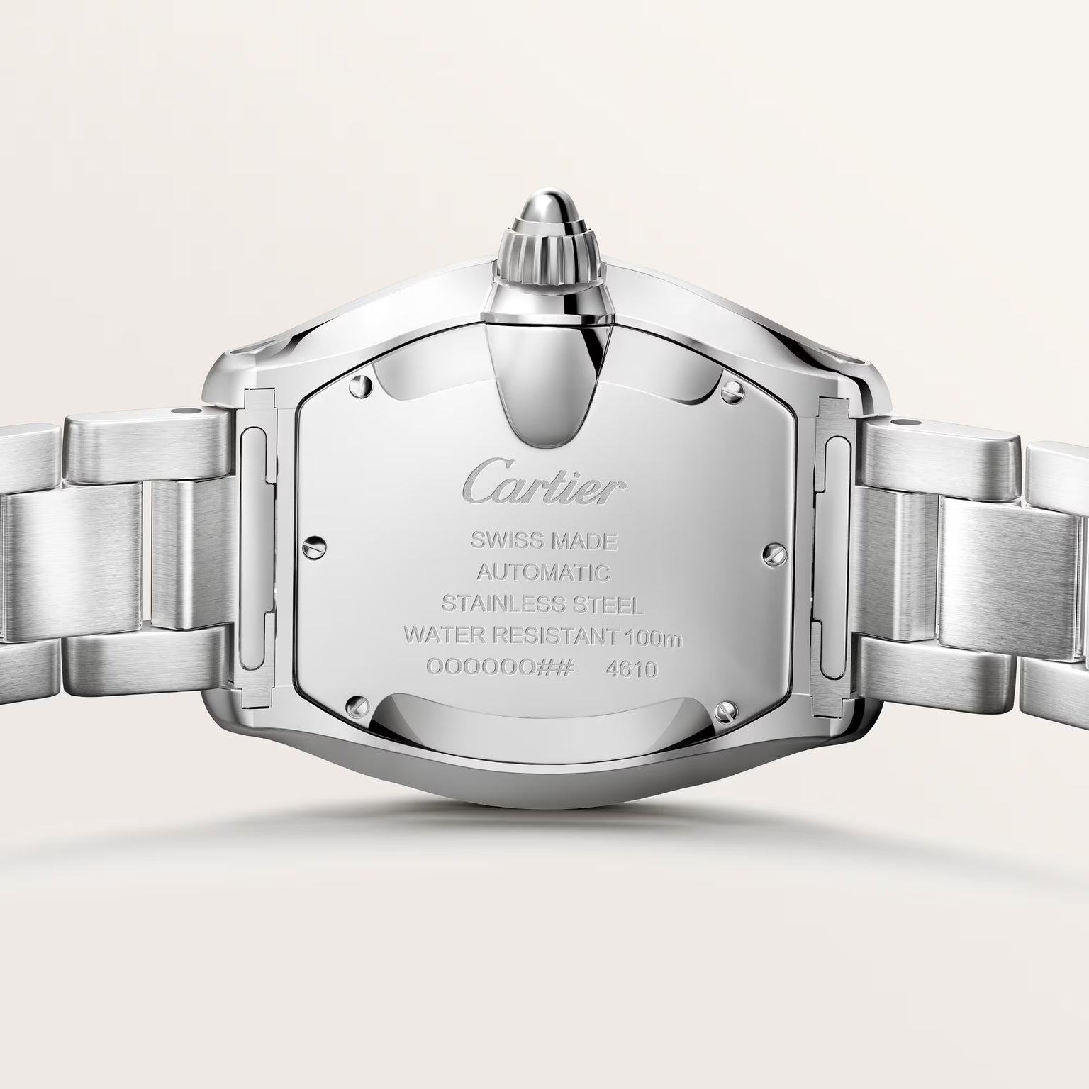 Cartier stainless steel watch back case showing Swiss made automatic movement and water-resistant 100m specifications.