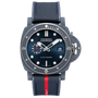 The Panerai Submersible QuarantaQuattro Luna Rossa Ti-Ceramitech™ features a navy blue dial, textured strap with red stripe, luminescent markers, date display, and a robust diver’s casing.
