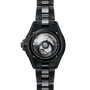 Black Chanel watch with mechanical components on a white background