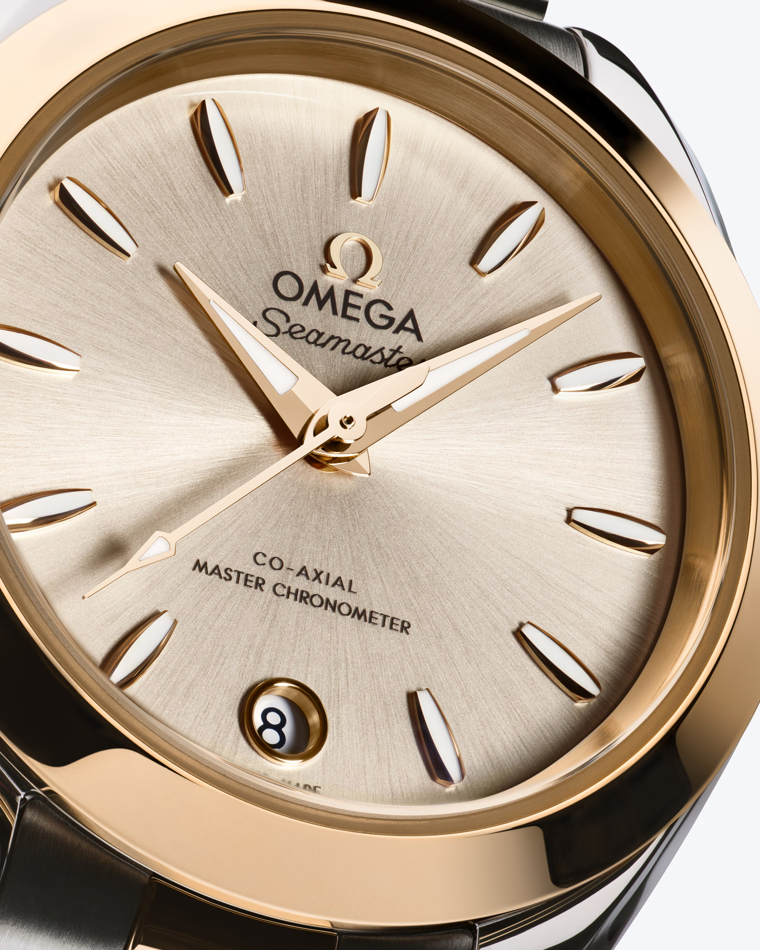 OMEGA Seamaster Aqua Terra 150M 30mm, Moonshine™ gold on steel, Moonshine™ gold Bezel, Silver Dial Watch with a Moonshine™ gold on steel integrated two-tone bracelet.