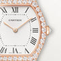 Rose gold Cartier Tortue watch with white dial, Roman numerals, and diamond-set bezel.