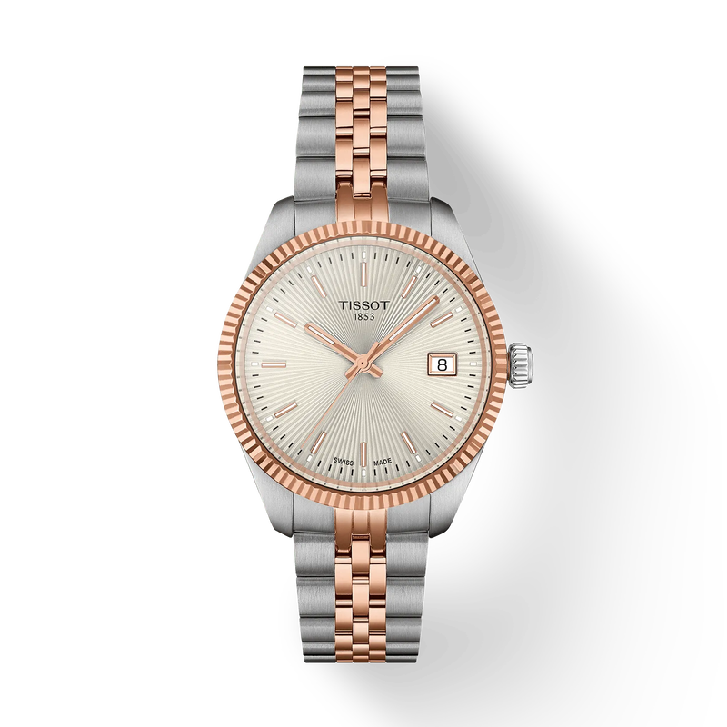 Tissot watch with two-tone rose gold and silver bracelet on a white background
