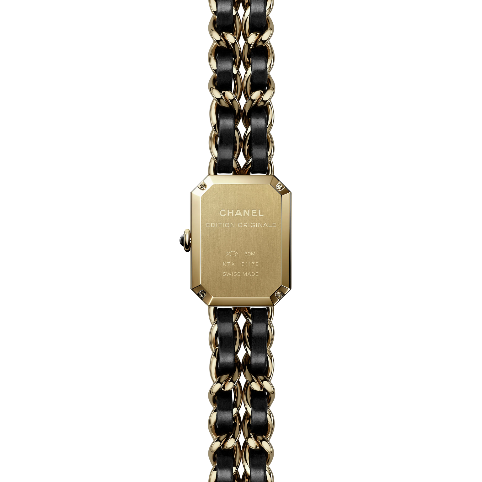 A close-up of the back of the Chanel Première Édition Originale Small Model, a rectangular yellow gold steel wristwatch with a black and gold chain-link band, engraved with CHANEL ÉDITION ORIGINALE and other details.