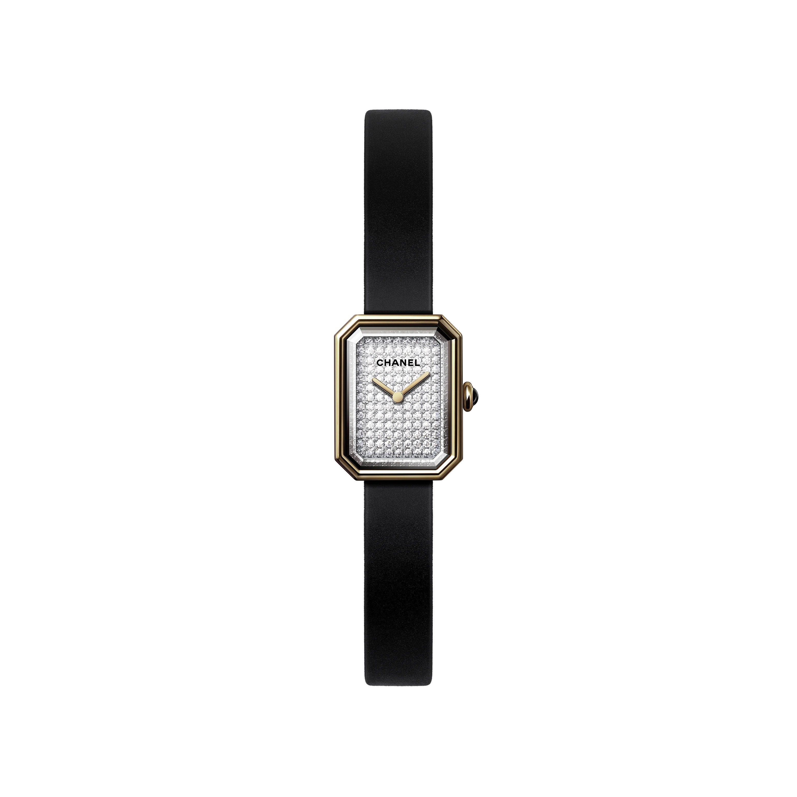 The Chanel Première Ribbon is a luxury women’s wristwatch featuring a slim black rubber strap, rectangular yellow gold-edged face, diamond dial, gold hands, and the iconic Chanel logo.