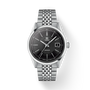 Tissot Visodate 39 stainless steel watch with black dial, date window, and bracelet strap.
