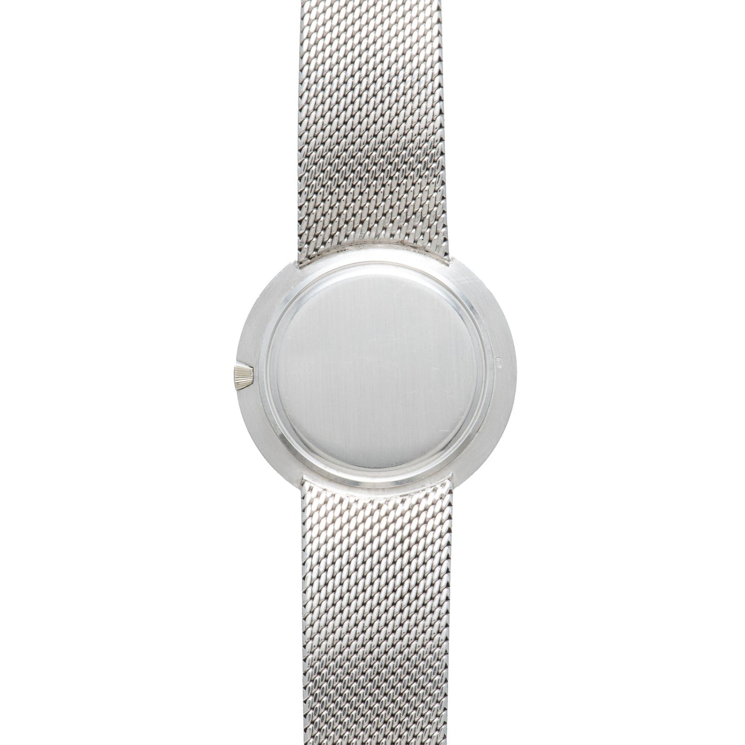 A minimalist Vacheron Constantin White Gold Diamond Bezel wristwatch featuring a blank, featureless round face with no visible markings or hands.