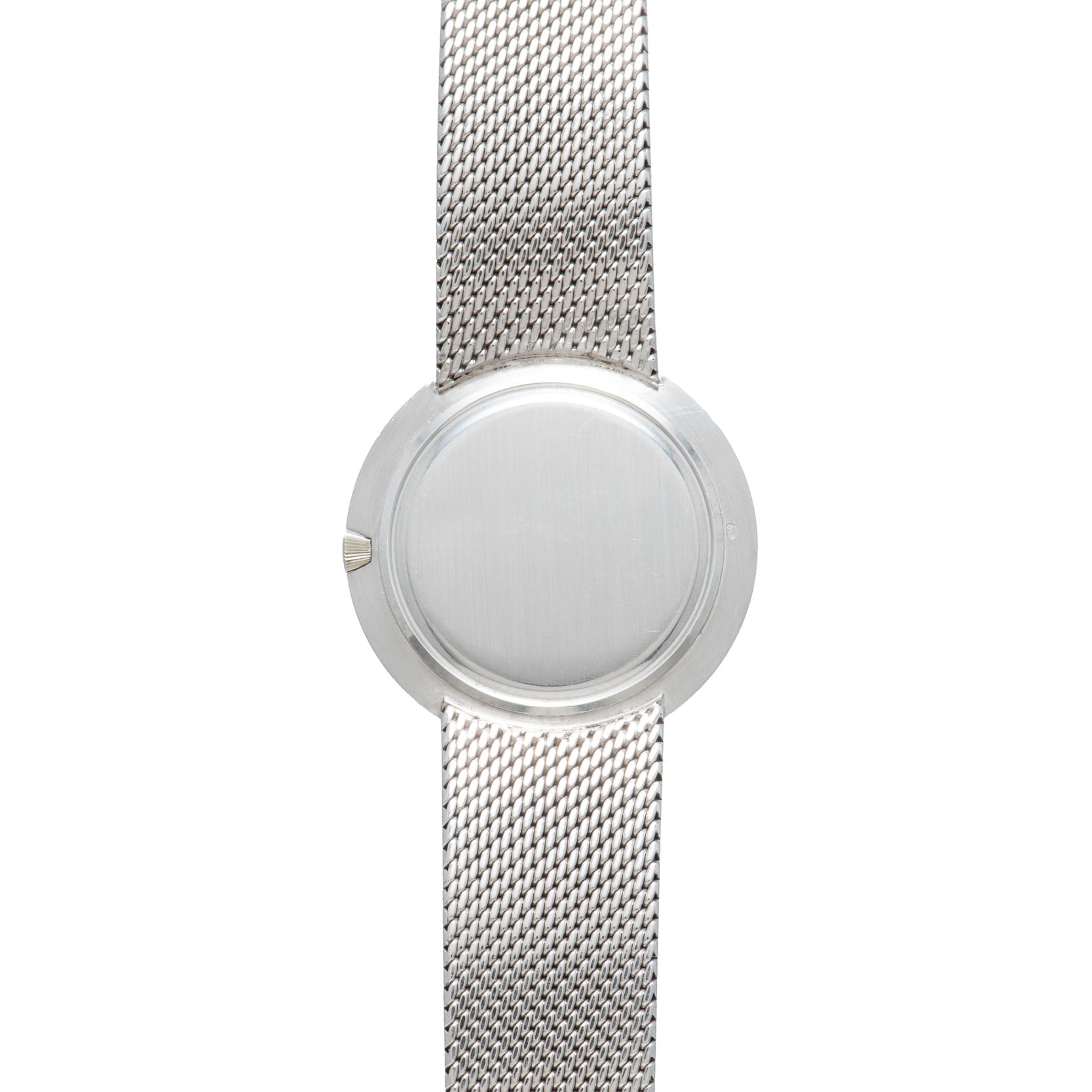 A minimalist Vacheron Constantin White Gold Diamond Bezel wristwatch featuring a blank, featureless round face with no visible markings or hands.