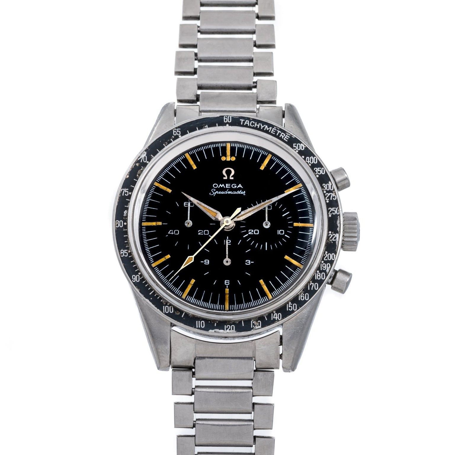 An OMEGA Speedmaster wristwatch featuring a black dial, metal strap, and tachymeter bezel.