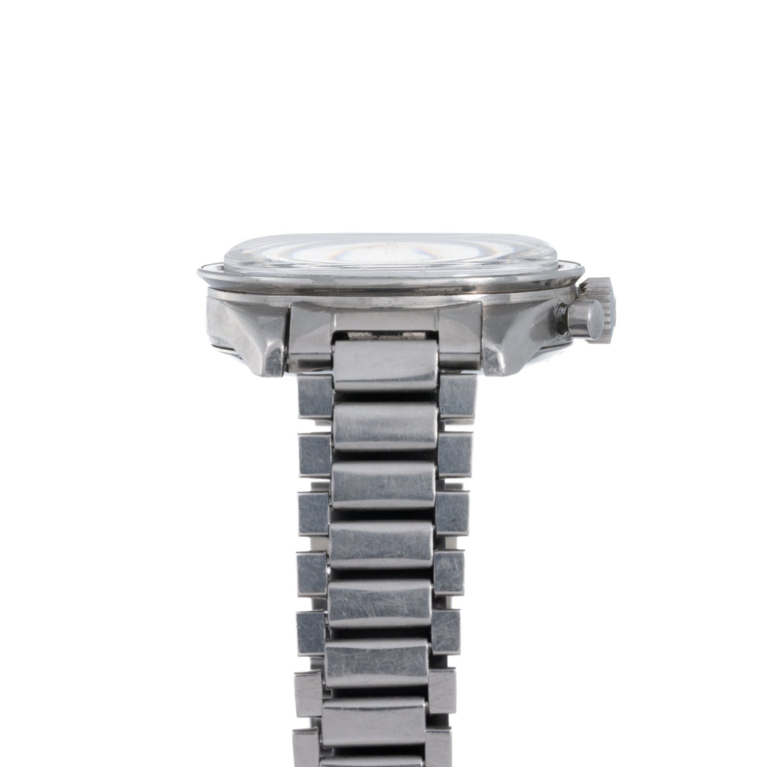 OMEGA Speedmaster wristwatch displayed from the side, with a round face and linked silver metal band.