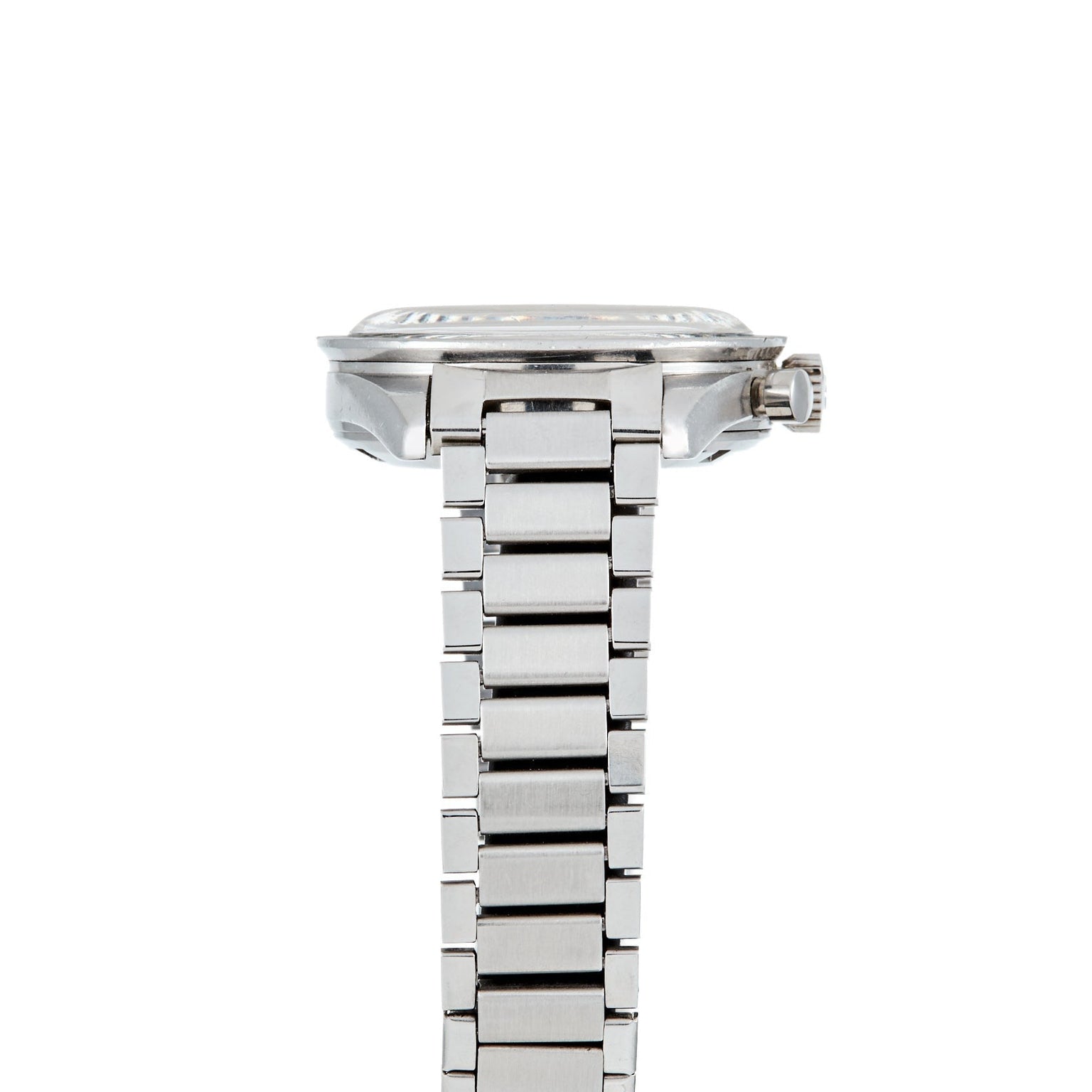 Side view of the Watches of Switzerland Speedmaster Ed White, a silver metal wristwatch with a linked band, showing the crown and part of the face.