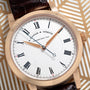 The Lange & Söhne Richard Lange watch features Roman numerals on a patterned dial, offering true luxury.