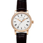 The Richard Lange by Lange & Sohne is a gold wristwatch featuring a white face with Roman numerals and a brown leather strap.
