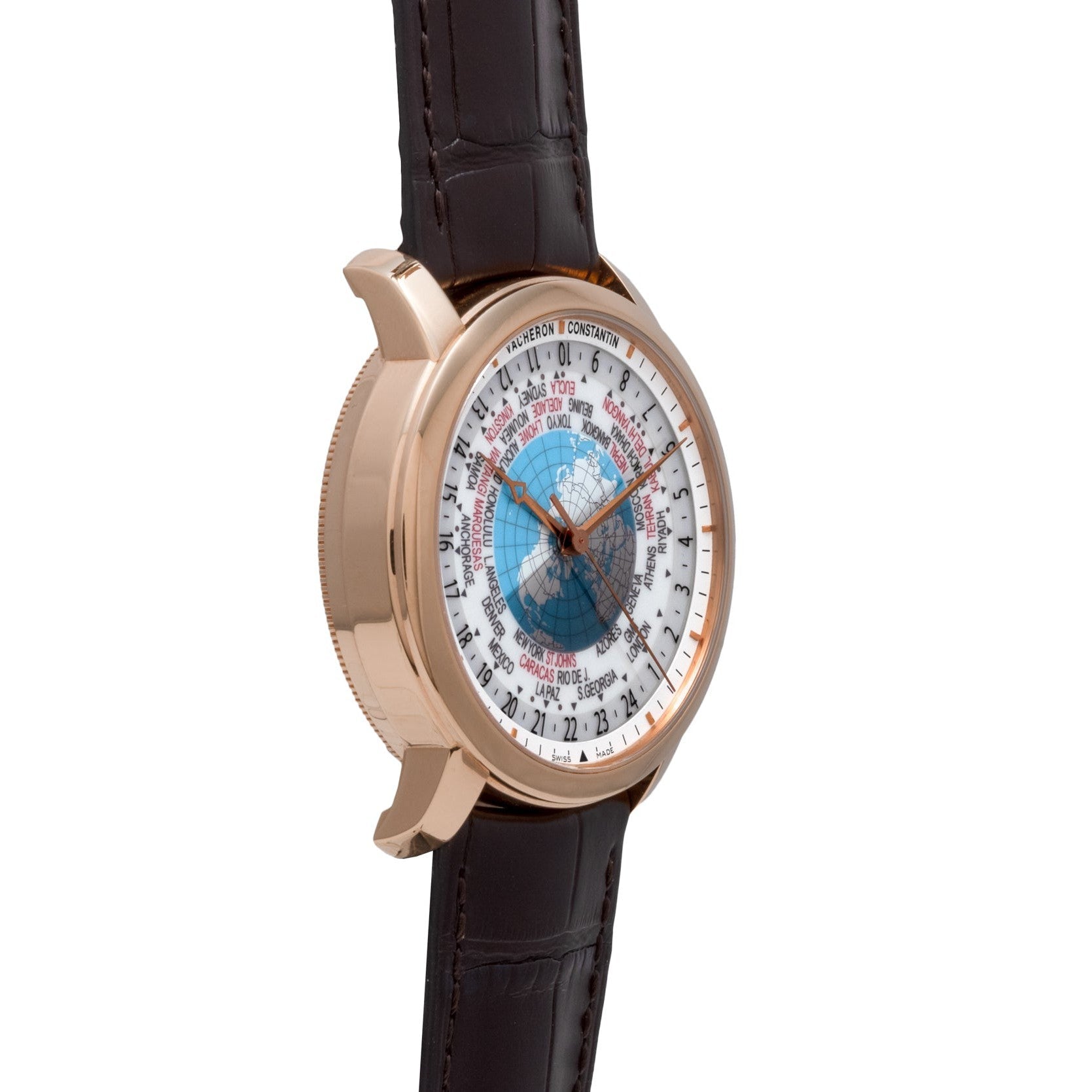 The Vacheron Constantin Traditionnelle World Time is a luxury wristwatch featuring a brown leather strap, rose gold case, and displays multiple world time zones.