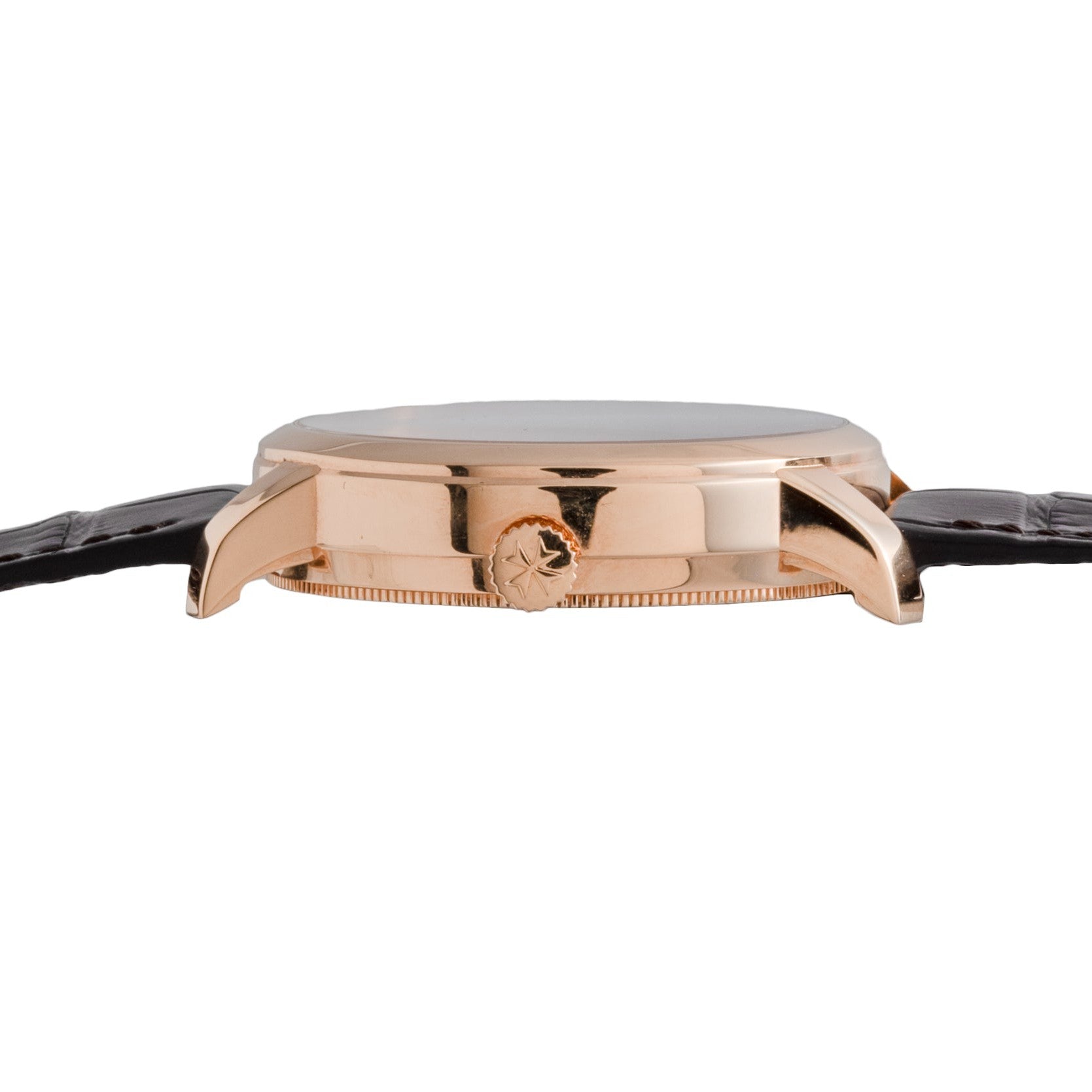 Side view of the Vacheron Constantin Traditionnelle World Time, a gold wristwatch featuring a black leather strap and a star emblem on the crown.