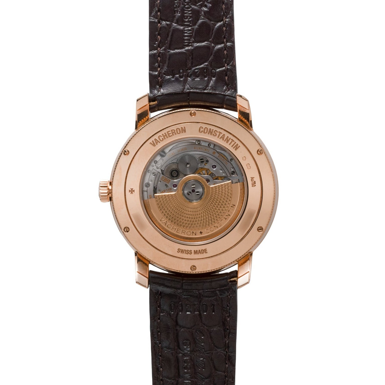 Back view of the Vacheron Constantin Traditionnelle World Time showing its mechanical movement and brown leather strap.