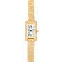 Cartier Tank watch featuring a gold rectangular case, diamond bezel, and beige crocodile leather strap on a white background.