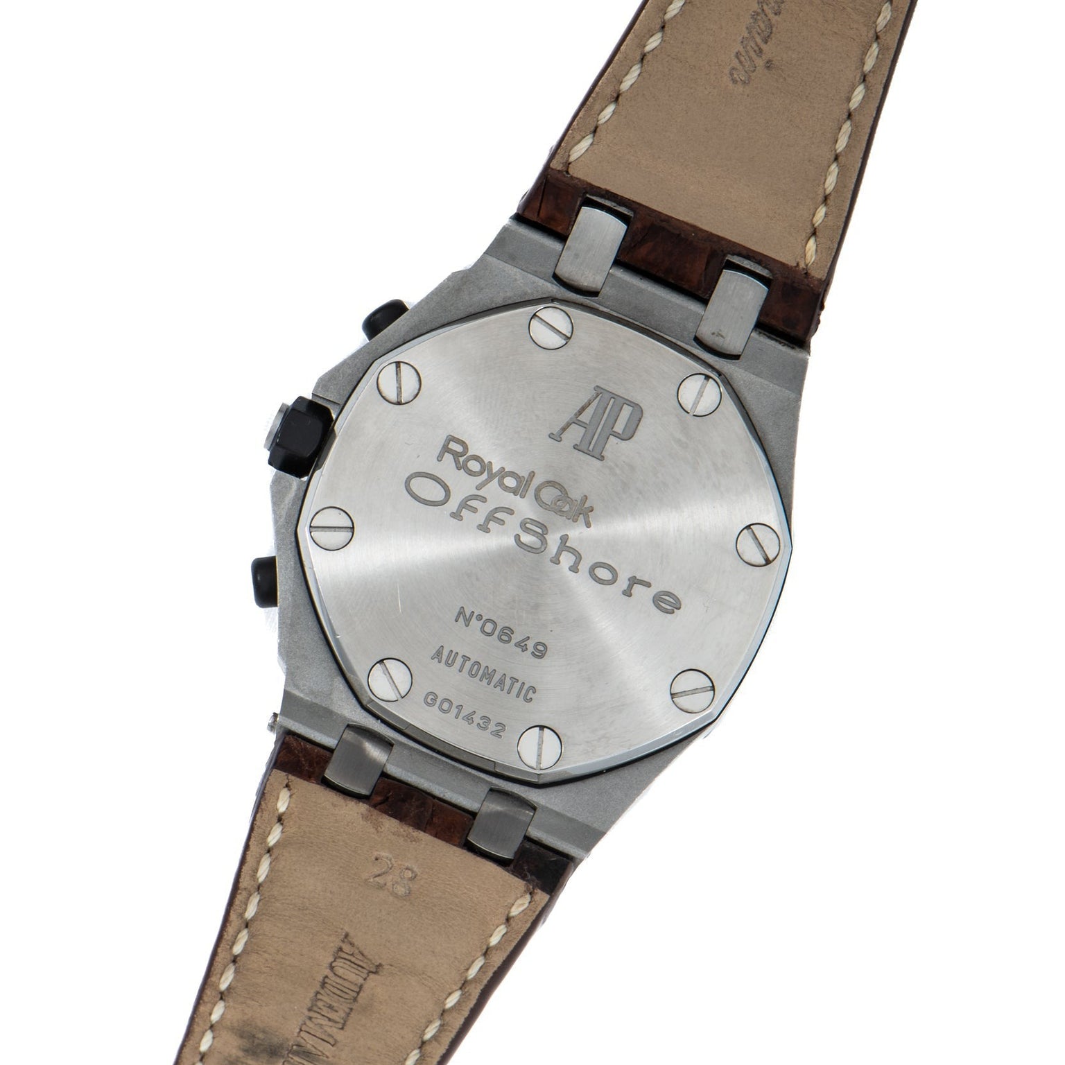 Back view of the Audemars Piguet Royal Oak Offshore Safari watch with leather strap, displaying engraved text and serial numbers.
