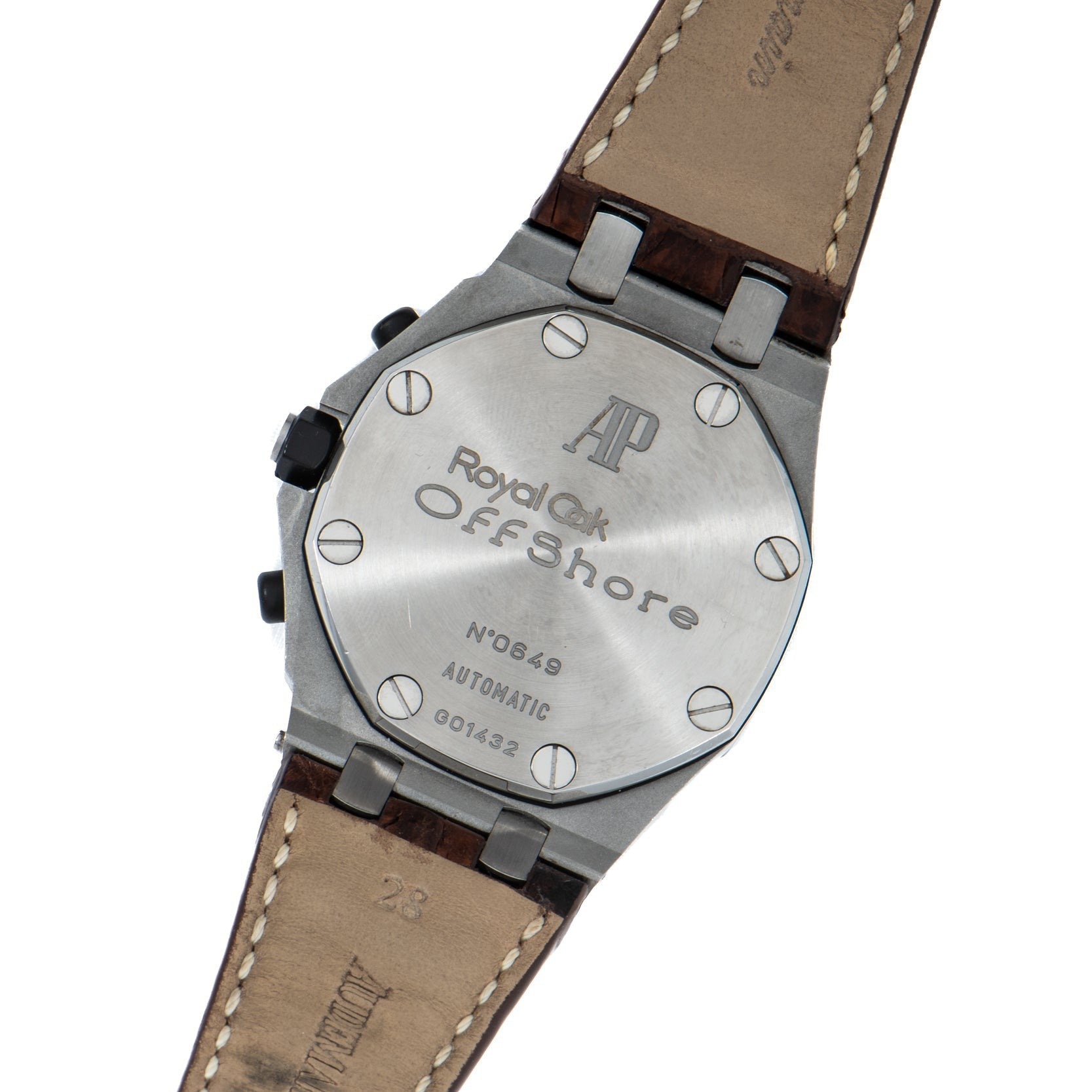 Back view of the Audemars Piguet Royal Oak Offshore Safari watch with leather strap, displaying engraved text and serial numbers.