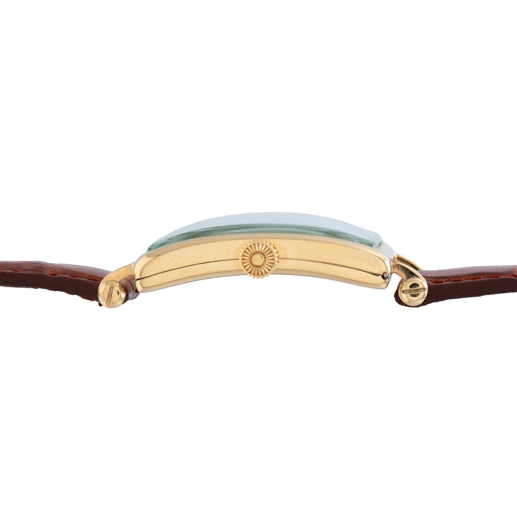 Side view of the Patek Philippe Birks Rectangular Dress Watch, featuring a gold case, brown leather strap, and a green-tinted crystal face.