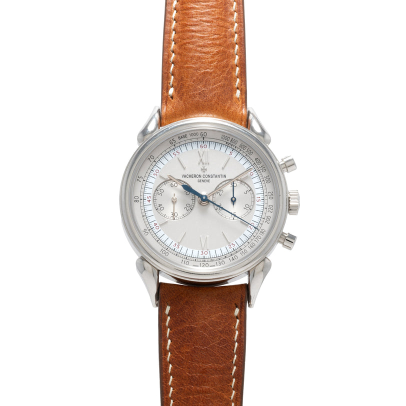 A Vacheron Constantin Historiques Cornes De Vache Chronograph wristwatch in silver with a brown leather strap and chronograph dials.
