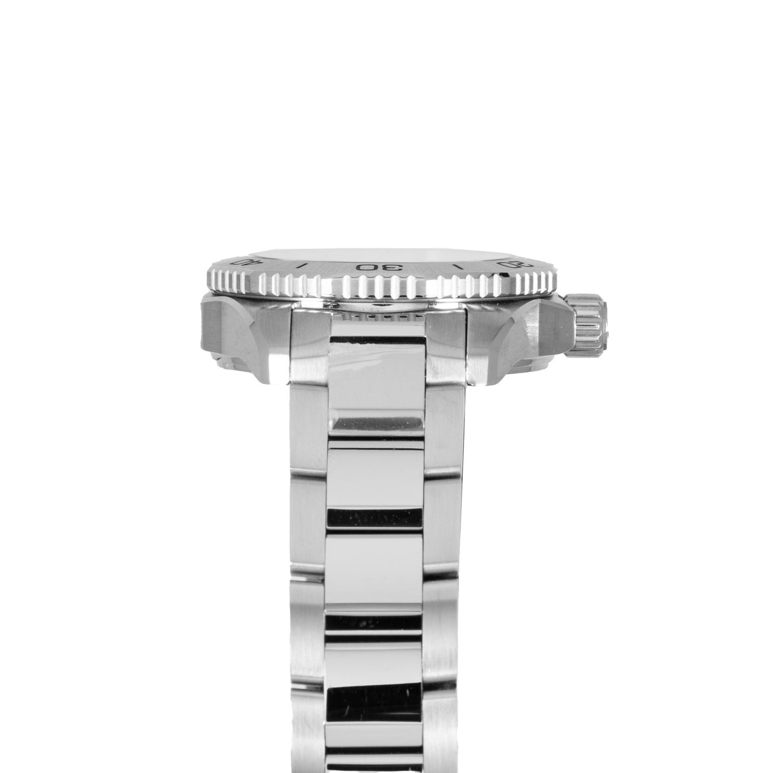 Side view of the TAG Heuer Aquaracer Ladies Mother Of Pearl silver metal wristwatch, featuring a ridged bezel and polished link bracelet.