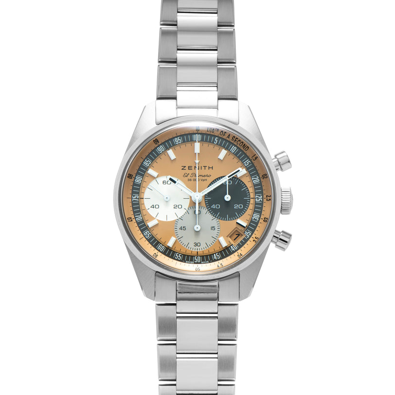 The Zenith Chronomaster Original for HODINKEE features a stainless steel case, tan, white, and blue chronograph dial, and a matching link bracelet.