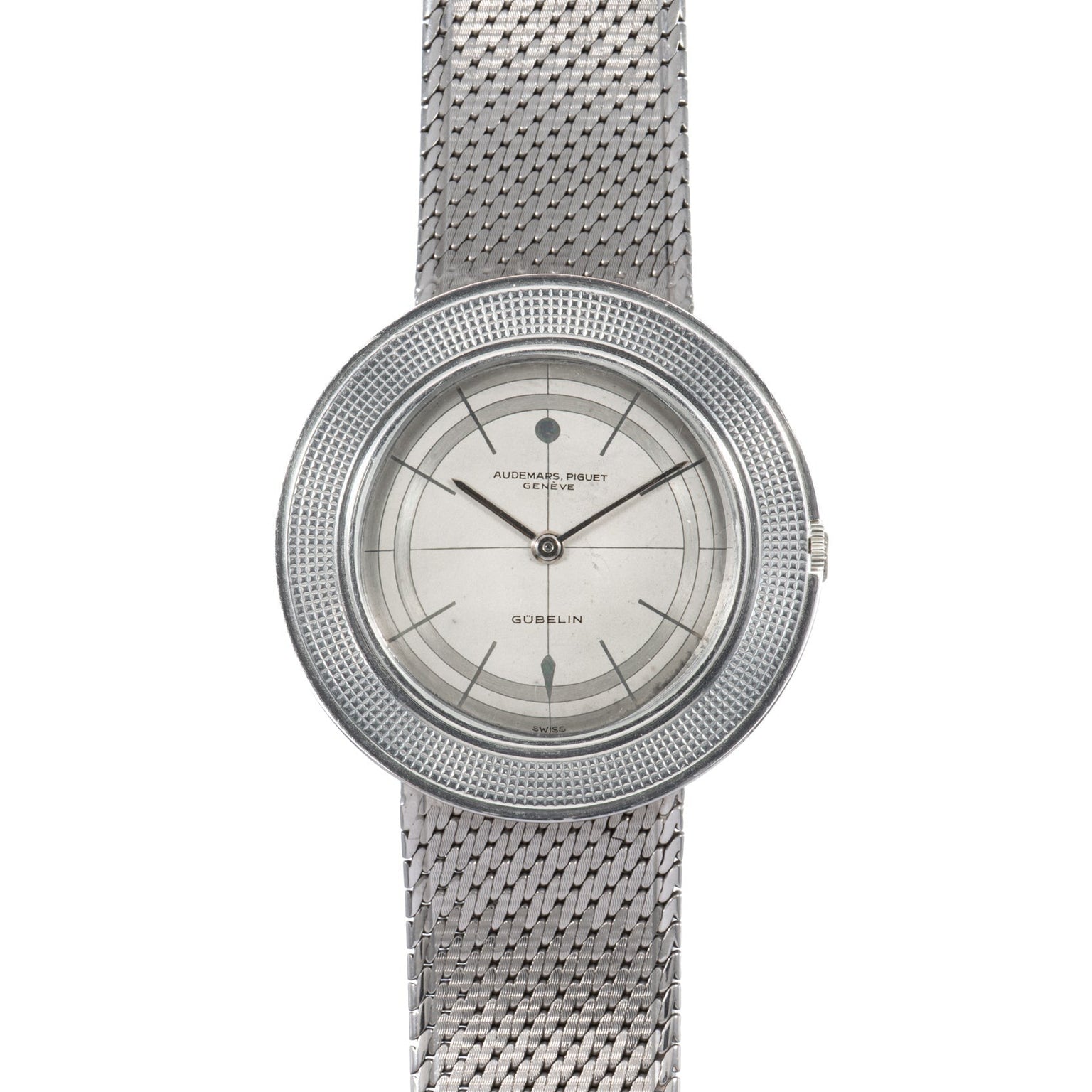 Audemars Piguet Signed Disco Volante Dress Watch Gübelin featuring a silver mesh band, round minimalist silver dial, and thin black hour markers.