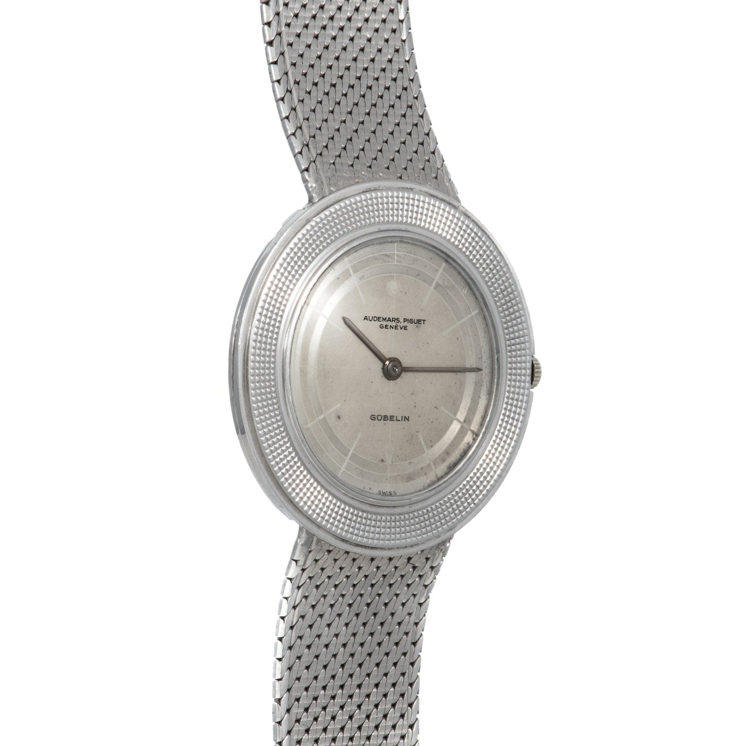 A silver Audemars Piguet Signed Disco Volante Dress Watch Gübelin featuring a mesh band and a minimalistic round face.